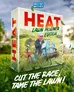 A box for the game "HEAT: Lawn Mower Edition" is prominently displayed, featuring vibrant artwork of two racers on lawn mowers speeding through a grassy landscape. The title "HEAT" is bold and colorful, with "LAWN MOWER EDITION" written in a playful, green font. The background depicts a sunny day with blurred trees and grass, enhancing the racing theme.