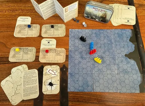 A compact naval wargame setup features the 