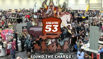 A bustling scene from SALUTE 53, Europe's largest independent wargames show, held at the London ExCel. The image captures a crowded exhibition hall filled with attendees exploring various vendor stands, with a prominent graphic overlay featuring the event's logo and artwork of a knight, a horse, and other characters. The atmosphere is lively, showcasing the excitement and engagement of the wargaming community.