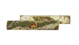 Two rolled maps are displayed, one featuring the region of Talabheim and the other depicting the Empire in 2276 IC. The maps are presented in a cylindrical packaging adorned with intricate designs, including a colorful emblem at the center. The overall color scheme is earthy, with greens and browns, reflecting the landscapes of the maps inside.
