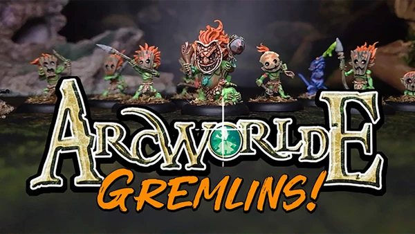Three distinctive Gremlin miniatures are prominently displayed against a dark, forested background. The first Gremlin on the left has a wooden mask-like face and vibrant green skin, while the central Gremlin features a fierce expression with a large, toothy grin and a decorative necklace. The third Gremlin on the right holds a weapon and has a playful stance, showcasing the whimsical design typical of the ArcWorlde faction. The text "ArcWorlde GREMLINS!" is boldly featured at the bottom, emphasizing the campaign's focus.