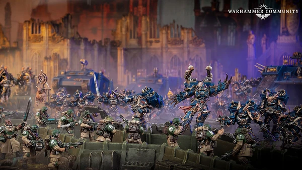 A dynamic scene features a group of intricately detailed Warhammer 40,000 miniatures engaged in battle. In the foreground, several armored soldiers in green uniforms are positioned behind a barricade, aiming their weapons. In the background, imposing figures in dark blue armor, adorned with spikes and intricate designs, advance menacingly, showcasing a mix of futuristic and gothic architecture in the blurred backdrop.
