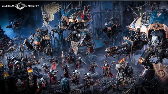 A dramatic scene showcases two imposing Chaos Knights, the Knight Ruinator and Knight Abominant, towering over a battlefield littered with detailed miniatures. The Knights feature intricate designs, with one adorned in dark metallic colors and the other showcasing a mix of blue and gold accents. Surrounding them are various smaller figures in red cloaks, wielding weapons, set against a backdrop of gothic ruins and atmospheric lighting.