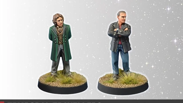 A pair of miniature figures titled "Temporal Travellers" stands on a textured base with tufts of grass. On the left, a figure in a green coat and vest has curly hair and a confident stance, while on the right, a figure in a black jacket with crossed arms and short hair presents a more serious demeanor. The background features a subtle starry effect, enhancing the theme of time travel.