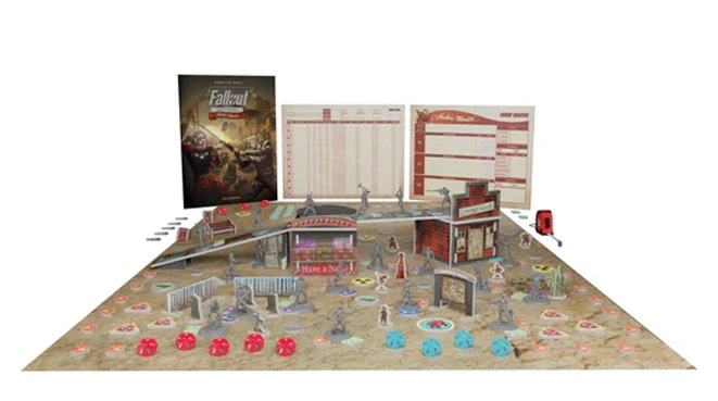The image features a tabletop setup for the Fallout: Factions skirmish game. In the center, a detailed battle map depicts a post-apocalyptic landscape with various terrain elements, including buildings, barriers, and scattered tokens. To the left, an 80-page rulebook is displayed alongside two player boards, while several multi-part miniatures are positioned throughout the scene, enhancing the immersive gameplay experience.