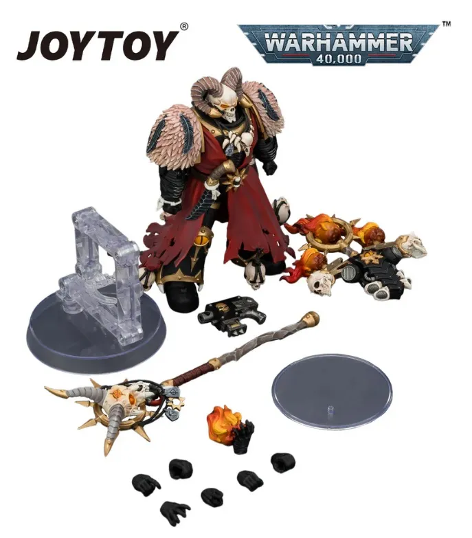 A figure of a horned character in ornate armor with a red cape, holding a large weapon. Surrounding the figure are various accessories: a clear plastic stand, a smaller skull-adorned weapon, a flame effect piece, a circular base, multiple small black pieces, and additional interchangeable parts including a helmet, a skull, and other detailed components. In the top left corner, the text "JOYTOY" is visible. In the top right corner, the text "WARHAMMER 40,000" is visible.