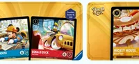 Donald Duck in a yellow race car, card titled "Donald Duck" with text "Dreamborne - Rare" and numbers 4 and 2.
