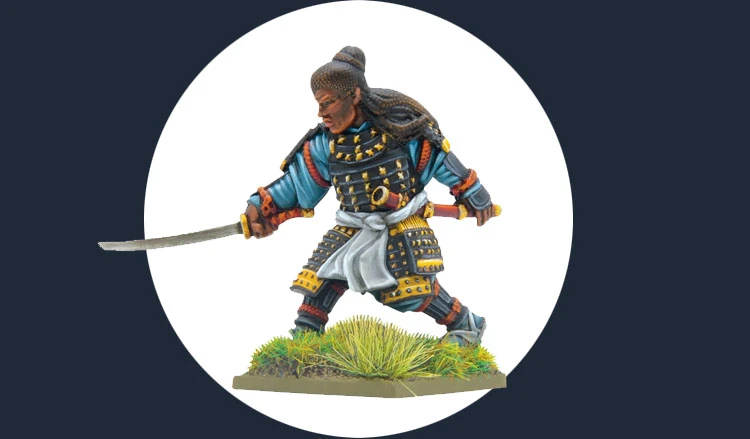 A detailed miniature of Yasuke, the Black Samurai, is depicted in the image. He is shown in a dynamic pose, wielding a katana, with his long hair styled in a topknot. His armor features intricate black and gold detailing, complemented by a blue and gray outfit. The base includes green grass, enhancing the overall presentation of the figure. The background is a simple circular design, emphasizing the miniature's vibrant colors and craftsmanship.