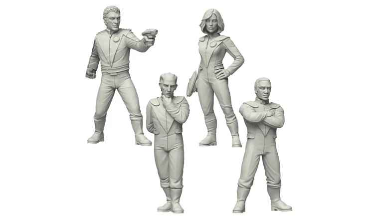 The image features four sci-fi miniatures from Crooked Dice Design Studio, showcasing a group of Galactic Explorers. Each figure is intricately designed, with two male characters and two female characters, all posed in dynamic stances. One male figure holds a weapon, while another appears contemplative, and the female characters exhibit confident postures. The miniatures are presented in a light gray color, highlighting their detailed features and attire.
