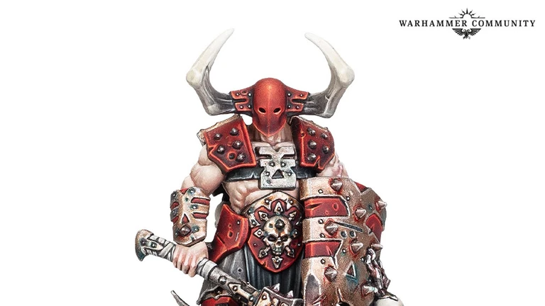 A muscular warrior stands prominently, adorned in red and black armor with sharp spikes and skull motifs. He wields a large, menacing axe in one hand and a shield with jagged edges in the other, both showcasing intricate detailing. His head is covered by a horned helmet, and he stands on a rocky base with sparse grass and skulls scattered around.