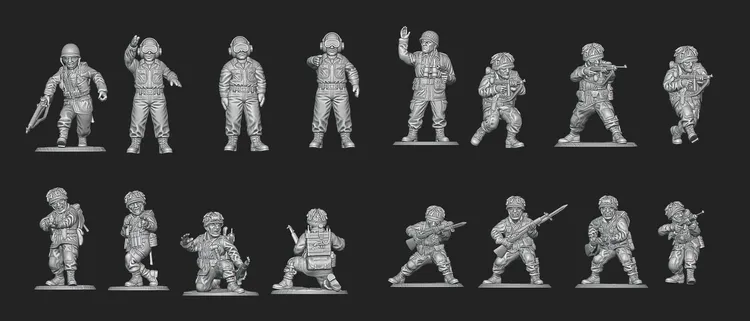 A collection of ten 28mm scale miniatures representing American soldiers from World War II is displayed against a black background. The figures include various poses, such as a soldier with a rifle, a paratrooper, and characters in military gear, showcasing details like helmets and uniforms. The miniatures are unpainted and feature intricate designs, highlighting the diversity of the U.S. armed forces during the 1944 campaign to liberate France.
