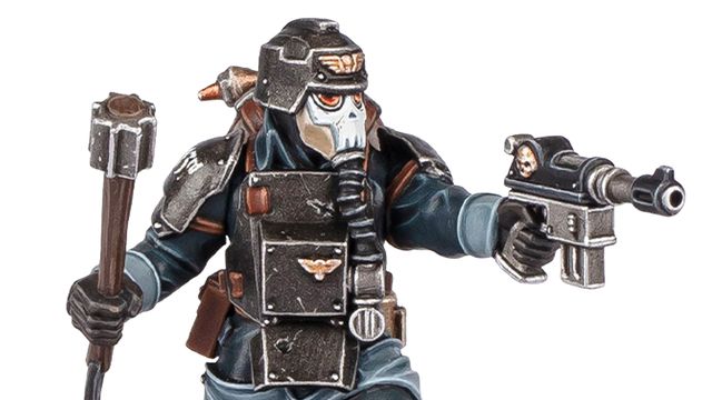 A detailed miniature figure of a Death Korps of Krieg Combat Engineer, wearing a dark uniform and a distinctive helmet with a skull motif. The figure is equipped with various tools and weapons, including a pistol in one hand and a device in the other. The overall color scheme features dark tones with metallic accents, emphasizing the character's militaristic design.