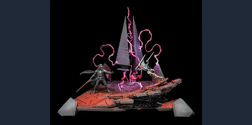 The scene features two miniatures: Ahsoka Tano, wielding her lightsabers, and Darth Vader, holding his red lightsaber, positioned on a detailed scenic terrain piece. The base is designed to resemble a Sith temple, with a reddish-brown surface and angular structures, while purple energy effects swirl around the duelists, enhancing the dramatic atmosphere. The backdrop includes sharp, triangular elements that evoke the temple's architecture, creating a dynamic setting for their confrontation.