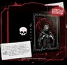 A framed cover art showing a hooded figure with a skeletal face, holding a lantern, set against a swirling red background.