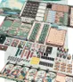 Spread of Rosalie board game with cards, tokens, boards, and components.