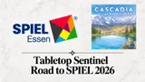 Cover art for Cascadia: Alpine Lakes board game showing a mountain lake scene with snow-capped peaks, green forests, and wildlife including a moose and beaver. Title reads "Cascadia Alpine Lakes." Logo for Spiel des Jahres 2026 and "Drop Sentinel" text visible.