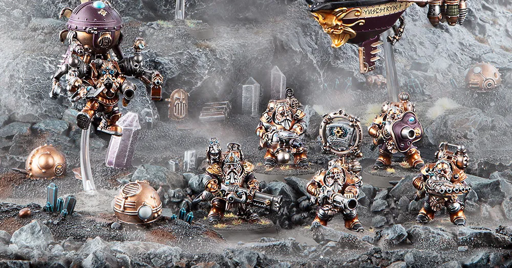 A group of Kharadron Overlords, depicted as flying dwarves in intricate nullsuits, stands on a rocky terrain. They are equipped with various steampunk-inspired weapons and gadgets, showcasing a mix of bronze and metallic colors. In the background, an airship hovers above, adding to the adventurous atmosphere of the scene.