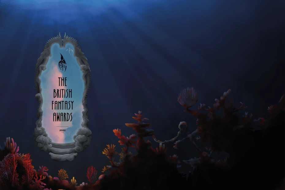 A stylized underwater scene features a large, ornate mirror framed in coral and seaweed, with the text "THE BRITISH FANTASY AWARDS 2022" prominently displayed in the center. The background is a deep blue, suggesting depth and mystery, with rays of light filtering through the water above. Colorful coral formations in shades of orange, pink, and purple surround the mirror, enhancing the fantastical underwater theme.