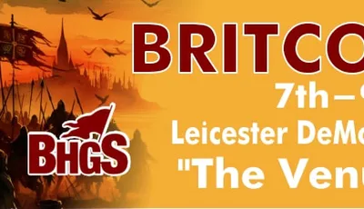 A promotional banner for Britcon 2026 features bold red text announcing the event dates, "7th-9th August," and the location, "Leicester DeMontfort University's 'The Venue@DMU'." The background includes an illustration of a historical figure in regal attire, wearing a crown, set against a dramatic scene with silhouettes of warriors and a fiery sky. The overall design emphasizes the historical theme of the wargaming convention.