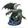 Life-size statue of Cthulhu with bat-like wings, tentacles, and glowing red eyes, emerging from swirling blue water base.