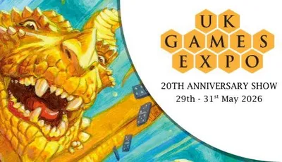 A vibrant illustration features a large, golden dragon with a playful expression, showcasing its sharp teeth and prominent features. The dragon is surrounded by a blue background with scattered game dice, emphasizing a whimsical and dynamic atmosphere. The UK Games Expo logo is prominently displayed in the corner, indicating the event's 20th anniversary from May 29th to 31st, 2026.