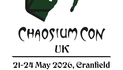 A logo for Chaosium Con UK features a stylized dragon's head in white, set against a dark green hexagonal background with a geometric design. Below the dragon, the text "CHAOSIUM CON" is prominently displayed in a bold, artistic font, with "UK" beneath it. The dates "21-24 May 2026" and the location "Cranfield" are included at the bottom in a simpler font.