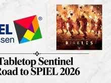 Geometric logo with blue "SPIEL Essen" text and multicolored triangular pattern. Below, text reads "Road to SPIEL 2026." Right side shows booklet cover with fiery scene: silhouetted devil figures, torches, and text "DIABLES."