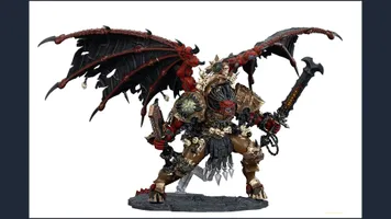 A large, intricately detailed statue of Angron, the Daemon Primarch of Khorne, stands prominently. He features massive, bat-like wings and a fierce expression, with a head that appears relatively small compared to his muscular body. Adorned with skulls and ornate armor, he wields a large sword in one hand and a weapon in the other, standing on a textured base that enhances the dramatic effect of the figure. The color palette includes deep reds, blacks, and metallic tones, emphasizing his menacing presence.