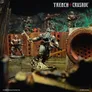 A detailed scene from the Trench Crusade game features a central miniature, a warrior clad in dark armor with a hood and a weapon raised, standing on a grotesque base that resembles twisted, organic forms. In the background, several other soldiers are positioned, armed and ready, against a backdrop of rusted metal and crumbling terrain, evoking a grim and war-torn atmosphere. The image is framed by the game's title, "TRENCH CRUSADE," at the top, enhancing the thematic focus on the conflict between the forces of Heaven and Hell.