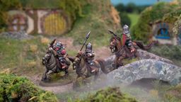 Three mounted halfling cavalry figures are depicted, each riding stout ponies and equipped with spears. The riders wear armor and helmets, showcasing a mix of colors, including silver and red accents. The scene is set in a lush, grassy landscape with rocky terrain and a distant background of rolling hills, creating a vibrant and dynamic atmosphere.