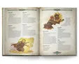 Open book with text and illustrations of fantasy spells and characters.