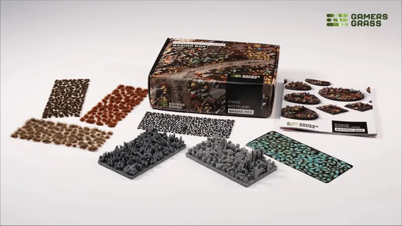 Chaos Wasteland Basing Box with grass tufts, rocks, and laser-cut plants.