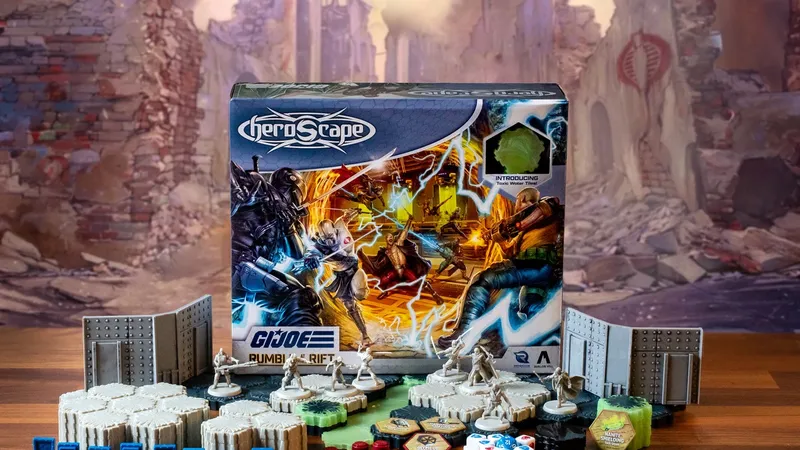 A G.I. JOE Heroscape: Rumble at the Rift Battle Box is prominently displayed in the center, featuring vibrant artwork of characters in action. Surrounding the box are various game components, including eight miniatures representing characters like Duke and COBRA Commander, modular hex terrain pieces, COBRA fortifications, dice, and markers. The background features a blurred, crumbling environment, enhancing the game's adventurous theme.