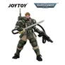 Action figure in green armor holding a sword and gun, JOYTOY and Warhammer 40,000 logos above.