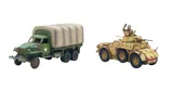 A green and brown camouflaged American Studebaker truck is positioned on the left, featuring a covered cargo area and a white star insignia on its side. Next to it, on the right, is a tan Autoblinda AB41 armored car, showcasing a rounded body and a turret, with a slightly weathered appearance. Both vehicles are detailed models suitable for tabletop gaming, reflecting their historical designs from WWII.