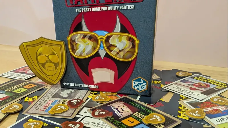 Crime Scene Tamperer game box with cards and tokens scattered on a wooden floor.