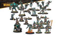 A diverse array of miniatures from the Crucible Guard expansion for Warmachine is displayed, featuring a mix of infantry and warjacks. The models are predominantly teal and brown, showcasing various characters including a heavy warjack, infantry soldiers, and combat alchemists, all set on circular bases with grassy textures. Notable elements include a warjack with a large cannon, soldiers wielding grenades, and a figure emitting flames, highlighting the faction's unique combat style and thematic elements.