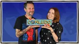 Two people holding a sign reading "CONLUDO" against a blue background.