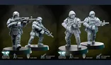 The image features four detailed miniatures from Anvil Industry's Special Forces range, showcasing futuristic soldiers in tactical gear. Two figures are positioned on the left, one aiming a weapon and the other in a dynamic stance, while two more figures on the right are also armed and appear ready for action. Each miniature is mounted on a circular base, and the design emphasizes modularity and multi-shell construction, suitable for 3D printing. The figures are presented in a monochromatic color scheme, highlighting their intricate details and features.