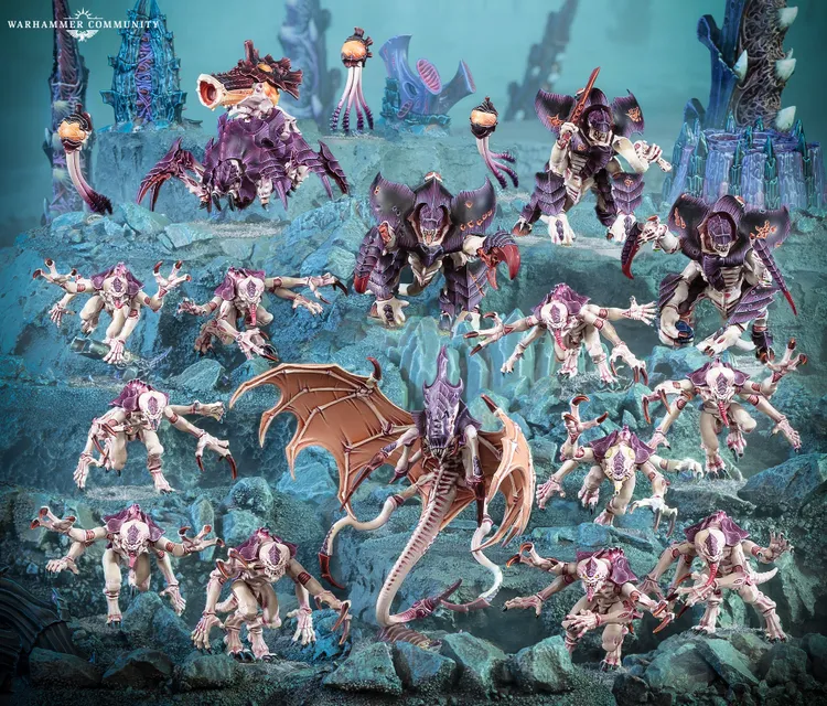 A dynamic scene showcases a Tyranid Assault Brood, featuring a variety of menacing xenomorph figures. In the foreground, ten rapid Genestealers are poised for action, flanked by three armored Tyrant Guard, while a Biovore and a Parasite of Mortrex add to the threatening presence. The backdrop features an eerie, underwater-like environment with vibrant colors and organic shapes, enhancing the overall atmosphere of impending danger.