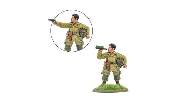 A 28mm miniature of an American paratrooper named "Thirsty Work" is depicted, holding a bottle of wine in one hand while the other arm is posed to hold a pistol. The soldier is dressed in a light green uniform with a backpack and a belt, standing on a grassy base. An inset shows a close-up of the arm holding the pistol, emphasizing the dual options for the model.