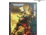 Warhammer 40,000 Codex: Orks book cover with armored Ork figure and flames.