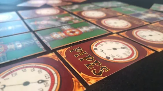 A close-up view of several Pipe Layout cards from the game 