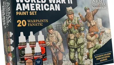 A paint set titled "World War II American Paint Set" features a box design showcasing three American soldiers in historical uniforms, set against a backdrop of crumbling walls. The box includes five paint bottles prominently labeled "WARPAINTS FANATIC," with colors such as "Dark Drab," "Medium Drab," "Paratrooper Tan," "Tang Red," and "Ensign Blue." The text emphasizes "20 WARPAINTS FANATIC" and "AUTHENTIC COLOURS FROM HISTORICAL SOURCES," highlighting the set's focus on historical accuracy.