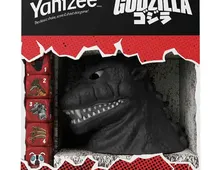 Yahtzee Godzilla box with Godzilla dice cup and red dice.