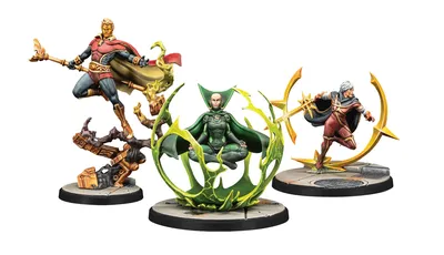 The image features three miniatures from Marvel: Crisis Protocol. On the left, Adam Warlock stands in a dynamic pose, wielding a staff and wearing a red and blue costume with a flowing cape. To the right, Moondragon is depicted seated in a meditative pose, surrounded by a green, swirling energy effect, dressed in a green suit. Both miniatures are mounted on circular bases, with intricate details highlighting their cosmic themes.