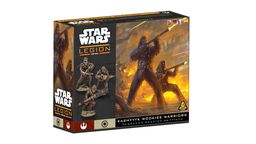 A box for the "Star Wars: Legion" game features a dynamic illustration of Kashyyyk Wookiee warriors in action, with two prominent Wookiees wielding blasters amidst a fiery backdrop. The left side of the box displays three detailed miniatures of Wookiee warriors, showcasing their distinctive fur and weaponry. The title "Kashyyyk Wookiee Warriors" is prominently displayed at the bottom, along with the game's branding and logos.