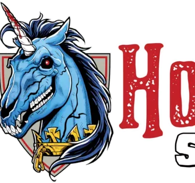 A stylized logo features a blue unicorn with a fierce expression, showcasing sharp teeth and a prominent horn. The unicorn is adorned with a golden collar and is set against a shield-like background. The text "Horror Scotland" is prominently displayed in bold, red letters, with a distressed texture, emphasizing the event's horror theme.
