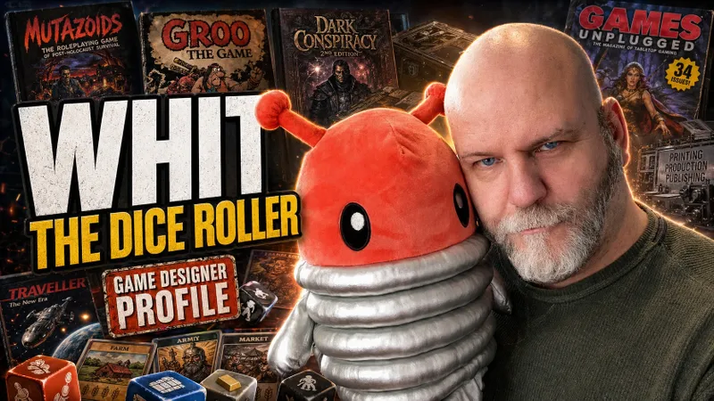 A man with a shaved head and a beard is holding a plush toy resembling a red creature with large eyes and a segmented silver body. He is wearing a dark green sweater and has a serious expression. In the background, there are various tabletop gaming items, including a magazine titled "Games Unplugged" and a box for "Dark Conspiracy 2nd Edition." The overall scene conveys a blend of gaming culture and personal connection to the hobby.