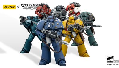 A group of eight tactical space marine action figures stands prominently, showcasing a variety of colors and chapter insignias. The marines are depicted in their original mark of armor, with detailed features and gear, including bolt guns and backpacks. The figures represent popular Warhammer 40k chapters such as the Imperial Fists, Ultramarines, Blood Angels, and Space Wolves, alongside traitorous factions like the Sons of Horus and Alpha Legion.